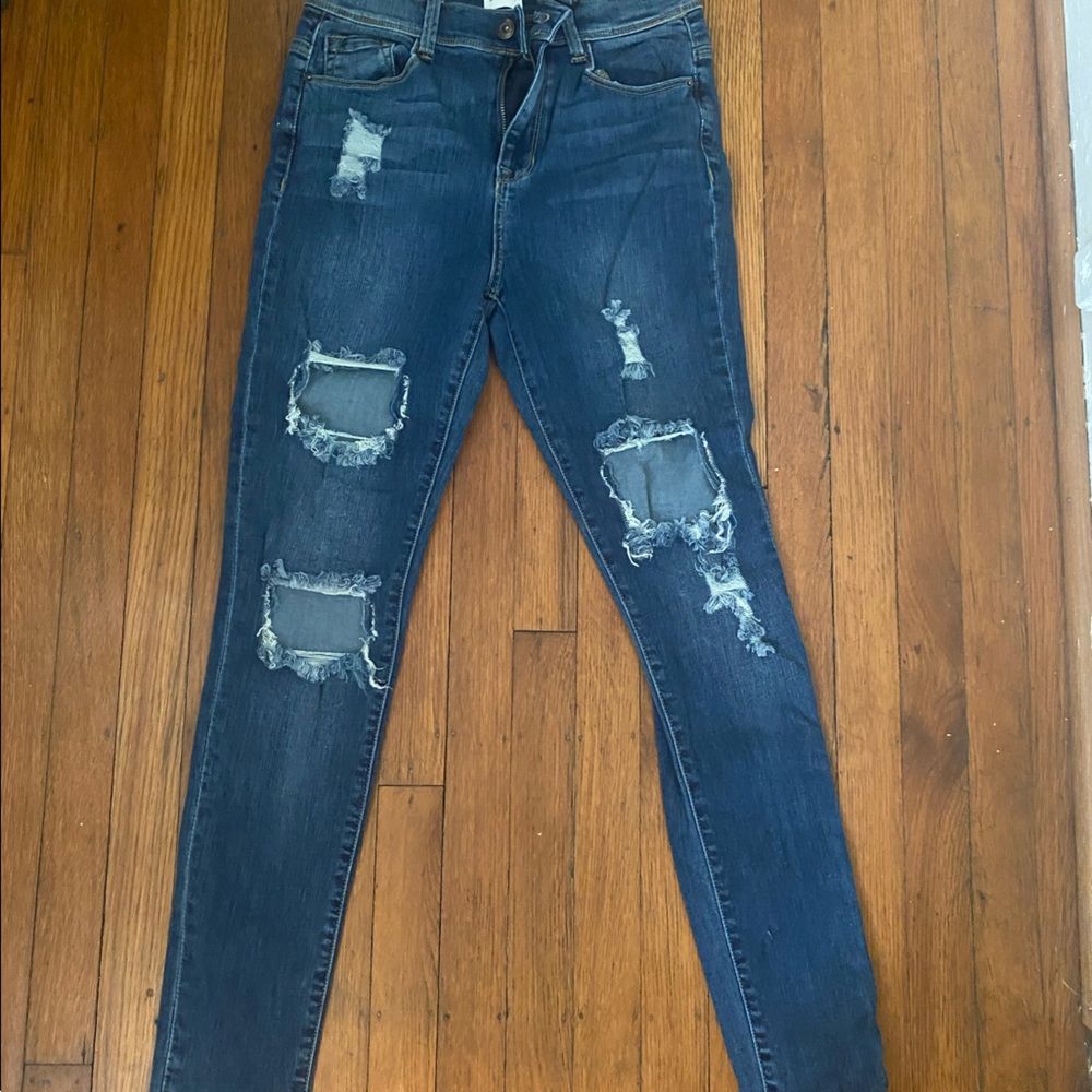 Sneak peek distressed jeans- never worn tags still on
